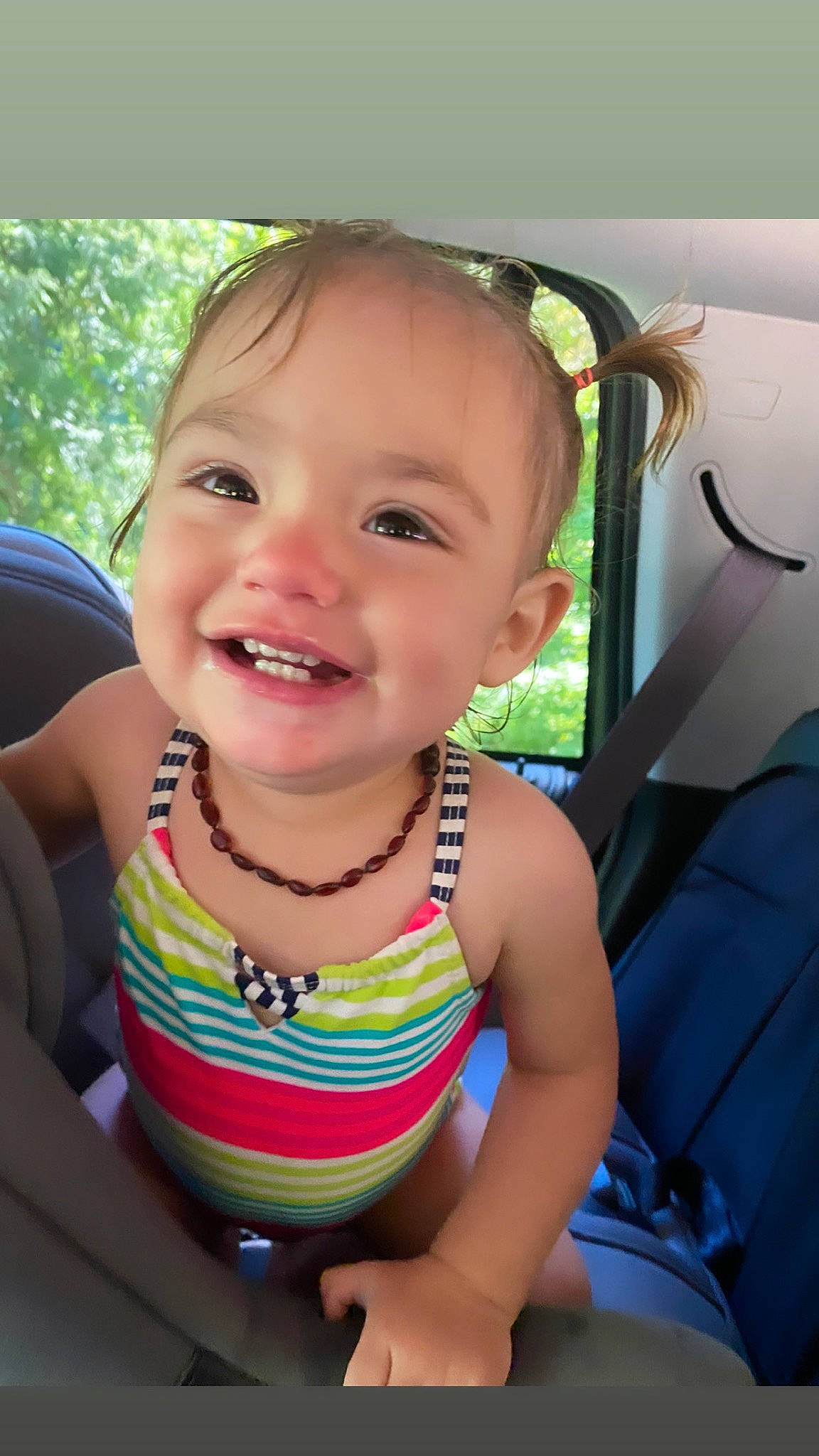 Paityn is registered to the contest to win money with this photo: baby_toddler_clothing, cheek, child, chin, eye, eyelash, finger, happy, iris, joy, leisure, lip, mouth, neck, nose, person, plant, skin, smile, summer