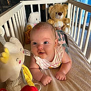 Juliette participe au concours pour gagner de l'argent avec cette photo : baby, bed, couch, cradle, crib, cushion, face, furniture, head, homedecor, indoors, infantbed, nursery, person, photography, plush, portrait, room, teddybear, toy