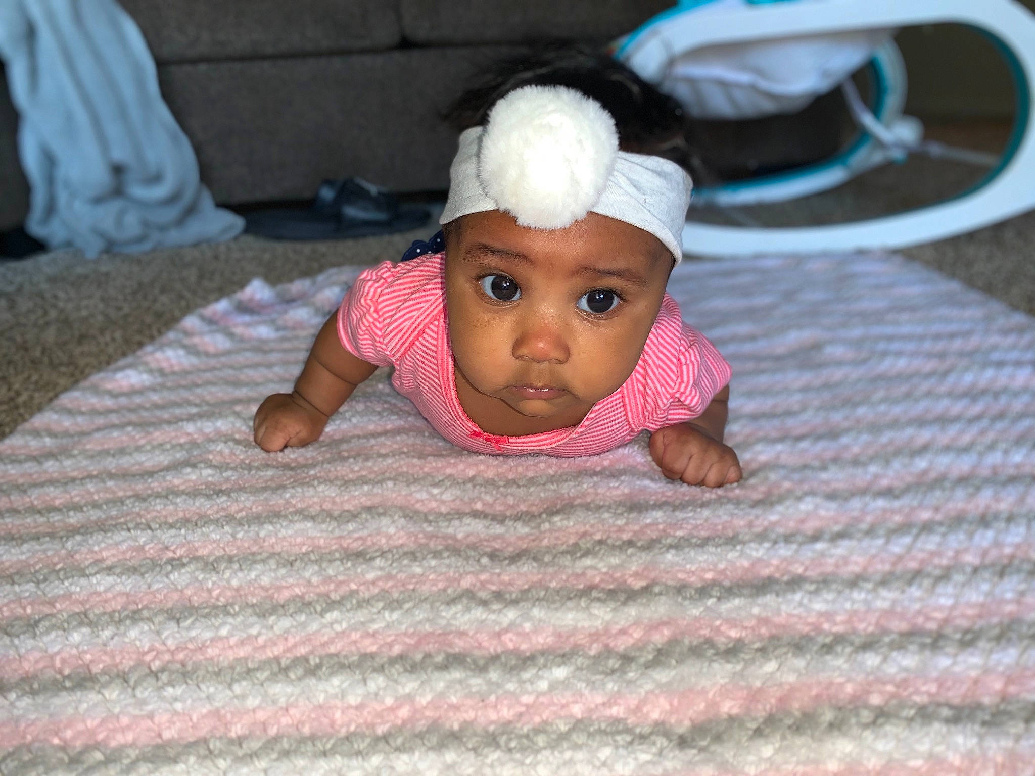 Keyarah is registered to the contest to win money with this photo: baby, child, crawling, headgear, headwear, person, pink, skin, toddler