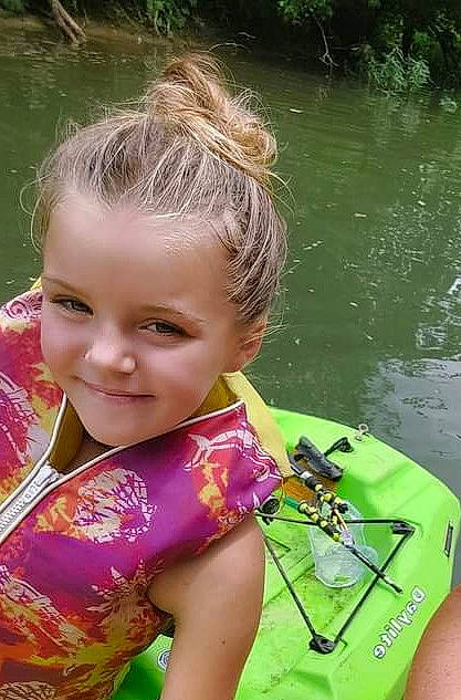 Kaytlynn joined the competition — help win amazing prizes! arm, bathing, boats_and_boating_equipment_and_supplies, chest, child, fun, grass, happy, joy, lake, leisure, magenta, people_in_nature, person, personal_protective_equipment, play, recreation, smile, summer, toddler