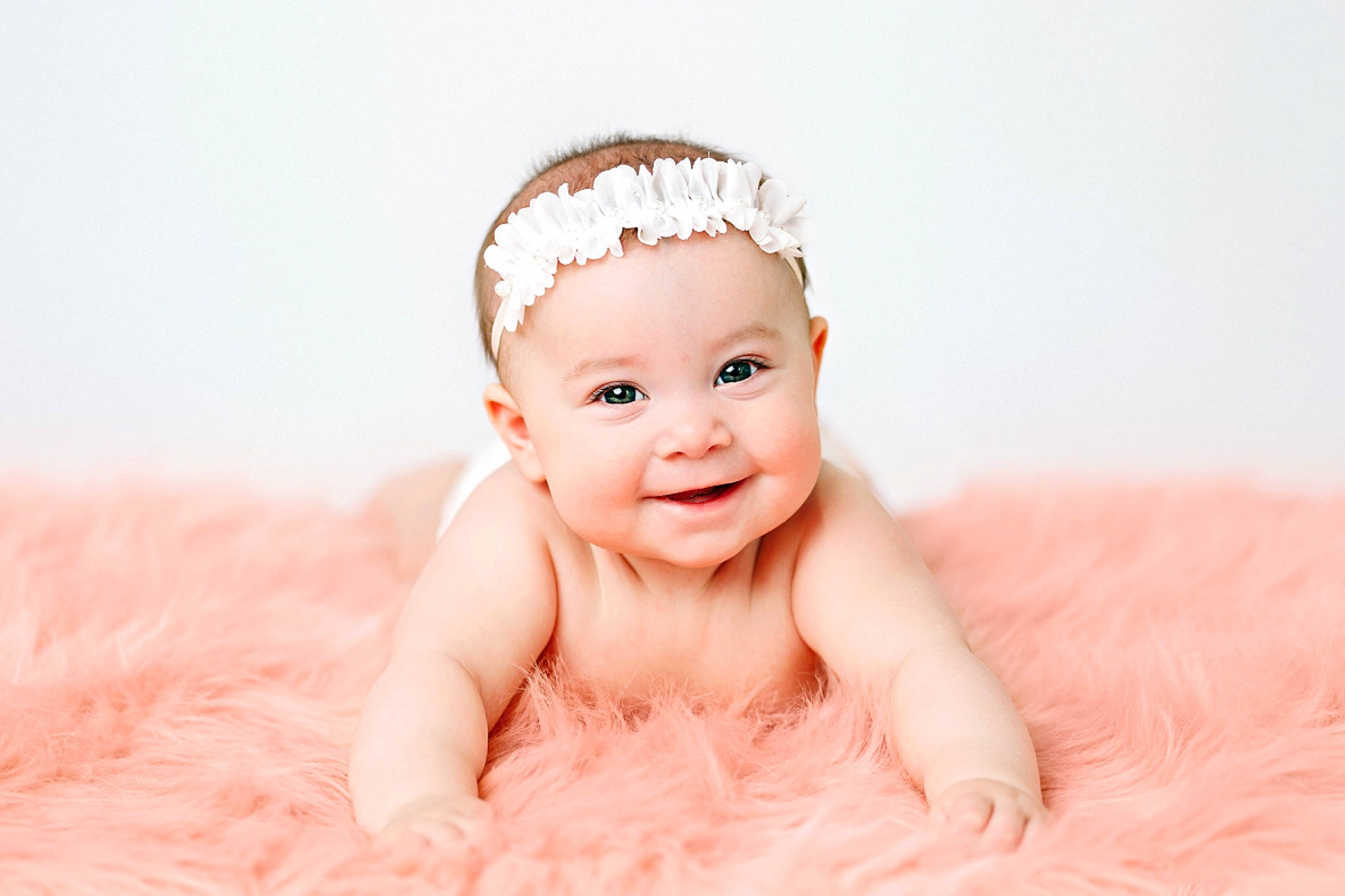 Maizy is registered to the contest to win money with this photo: baby, baby_toddler_clothing, bathing, cheek, child, ear, eye, eyelash, fashion_accessory, flash_photography, hair_accessory, happy, headband, headpiece, headwear, joy, lip, person, pink, portrait_photography