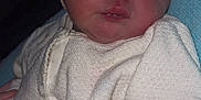 Hannaya a rejoint le concours — aidez-le/la à gagner de superbes lots ! baby, child, close_up, cozy, cute, indoor, infant, knit_hat, knitted_clothing, newborn, peaceful, person, pink, portrait, resting, sleeping, soft_fabric, strawberry_pattern, warm, white_clothing