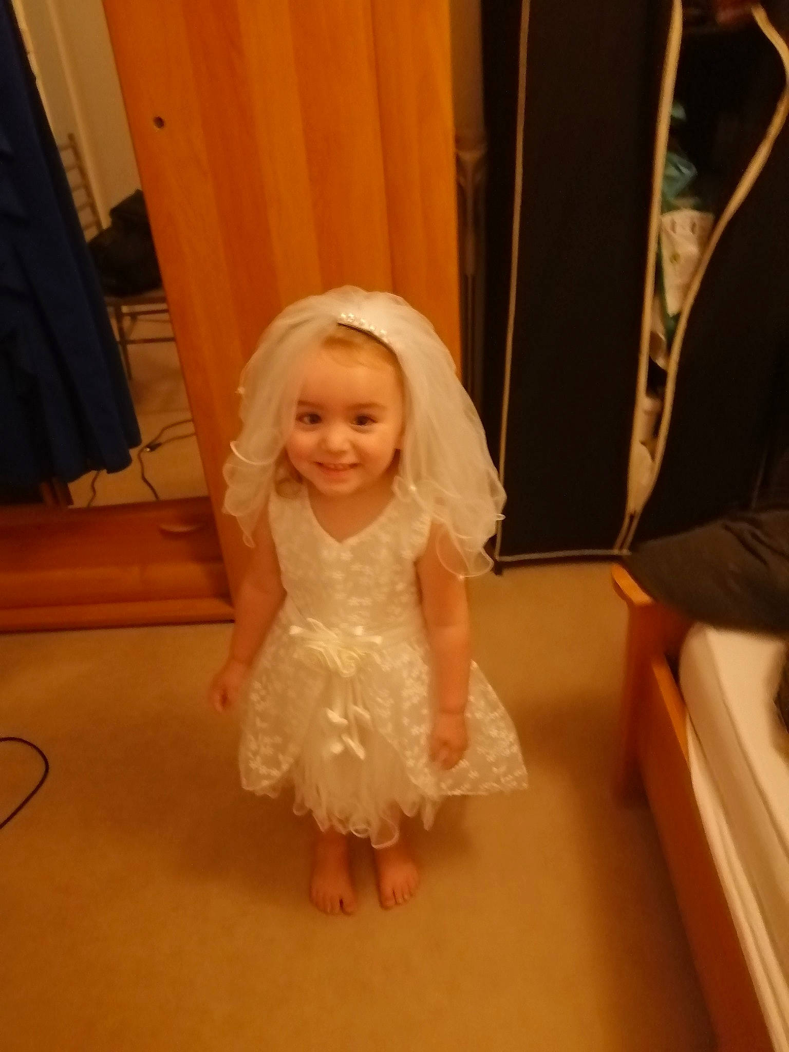 Maelyne participe au concours pour gagner de l'argent avec cette photo : baby, blond, bridal_accessory, bridal_party_dress, child, curtain, dress, embellishment, event, eye, face, floor, flooring, formal_wear, fun, happy, iris, joy, person, smile