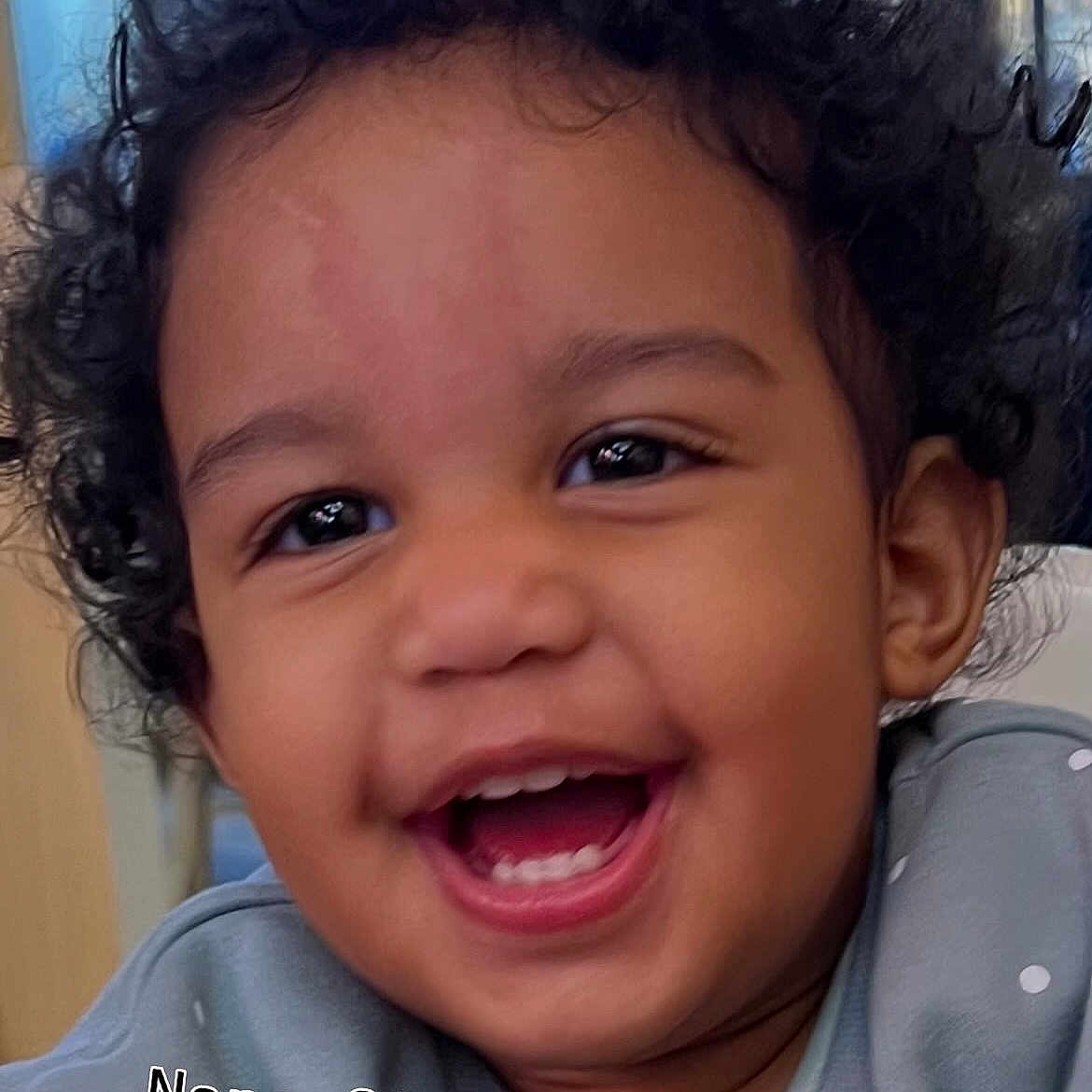 Taïna participe au concours pour gagner de l'argent avec cette photo : toddler, child, smiling, happy, curly_hair, face, portrait, indoor, clothing, sweater, polka_dots, cute, young_child, baby, person, head, expression, joy, closeup, skin