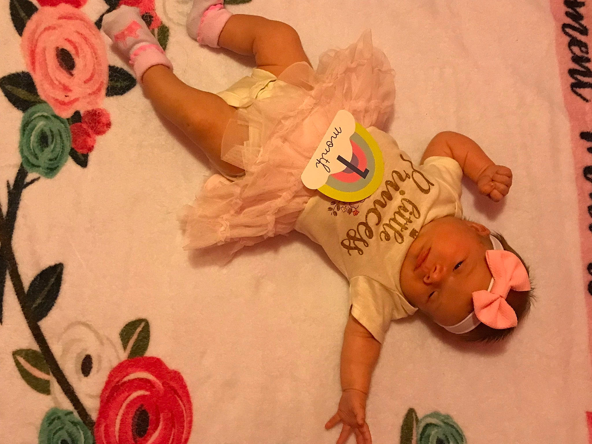 Kinlee joined the competition — help win amazing prizes! baby, carmine, child, finger, flooring, flower, flower_arranging, font, happy, headwear, orange, paper, peach, person, petal, pink, plant, rose, rose_family, rose_order