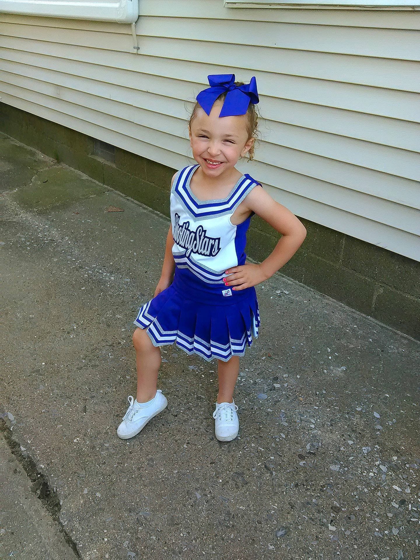 Rayelle Violet joined the competition — help win amazing prizes! blue, cheerleading_uniform, child, clothing, costume, day, electric_blue, footwear, fun, girl, headgear, joy, material, person, play, product, recreation, shoe, shorts, sports_uniform