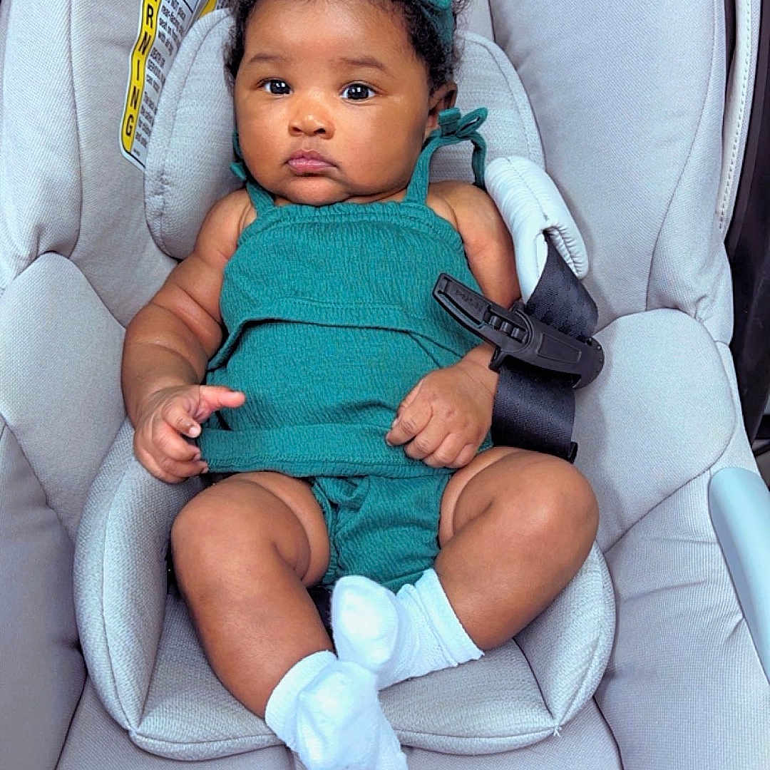 Teghan joined the competition — help win amazing prizes! baby, car, car_interior, carseat, clothing, cushion, face, glove, hat, head, homedecor, hosiery, newborn, person, photography, portrait, sleeping, sock, transportation, vehicle