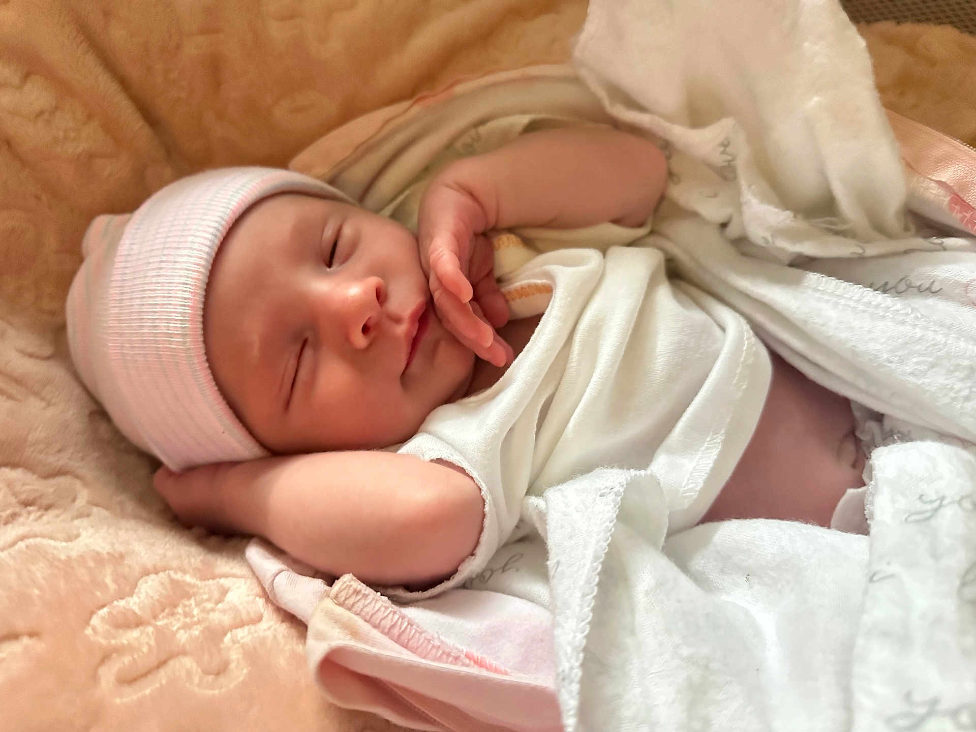 Ryleigh is registered to the contest to win money with this photo: baby, newborn, sleeping, blanket, beanie, soft, cozy, infant, cute, resting, peaceful, clothing, pale_skin, wrapped, portrait, indoors, closeup, face, hand, cute_baby