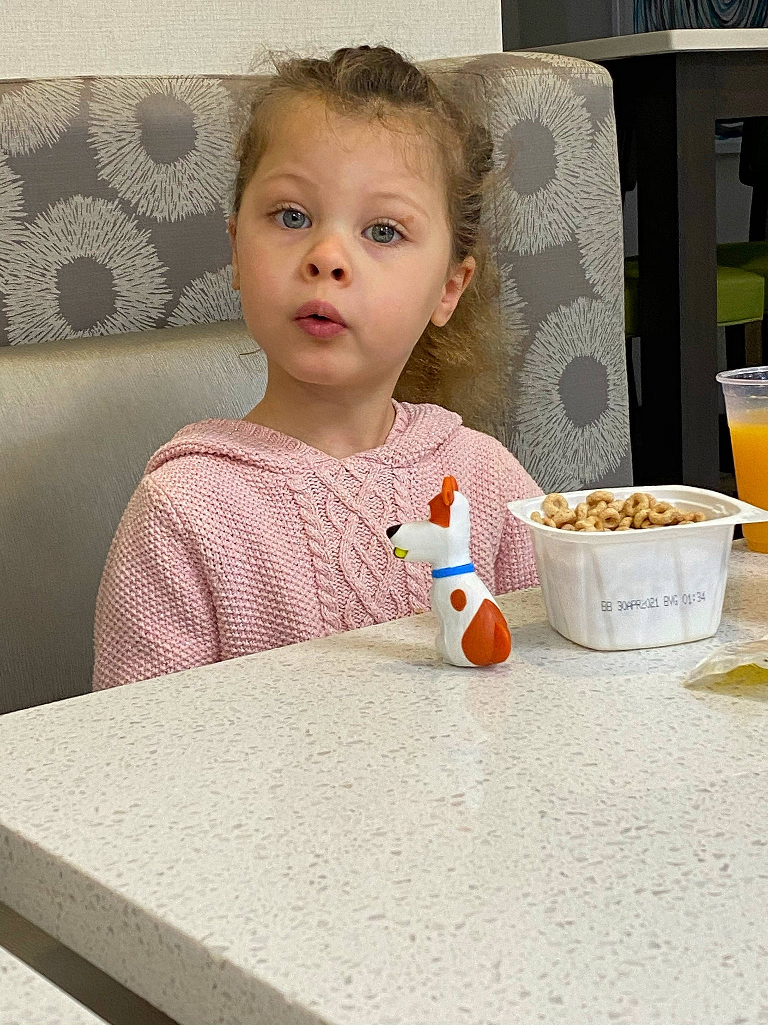 Christina is registered to the contest to win money with this photo: baby, bowl, chair, child, comfort_food, couch, drink, drinkware, face, food, fruit, fun, head, ice_cream, ingredient, person, plate, surprise, sweetness, table