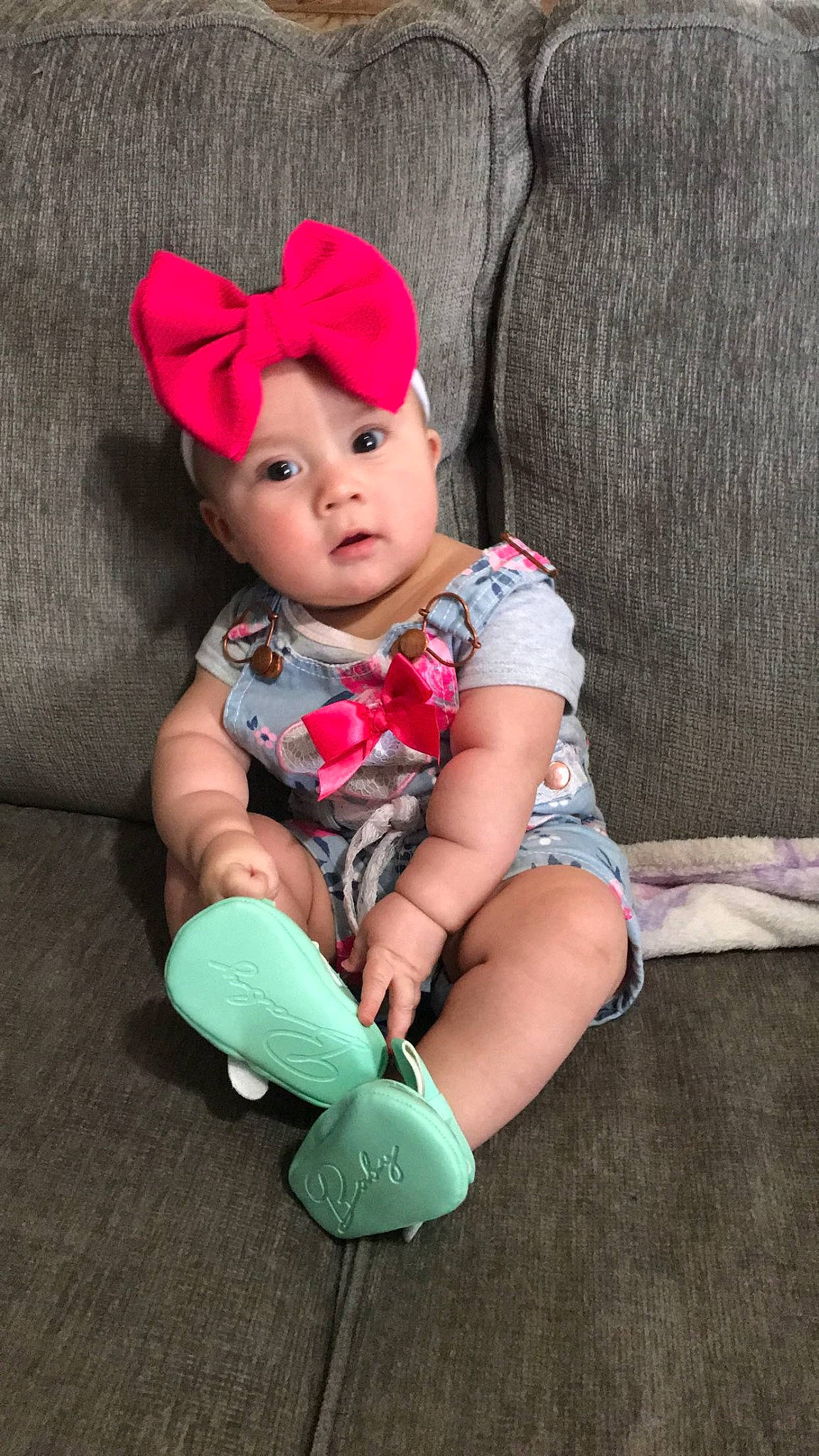 Serenity Marie joined the competition — help win amazing prizes! baby, baby_toddler_clothing, child, child_model, costume, costume_accessory, fashion_accessory, hair_accessory, headband, headgear, headwear, leg, pattern, person, pink, plant, play, sitting, skin, surprise