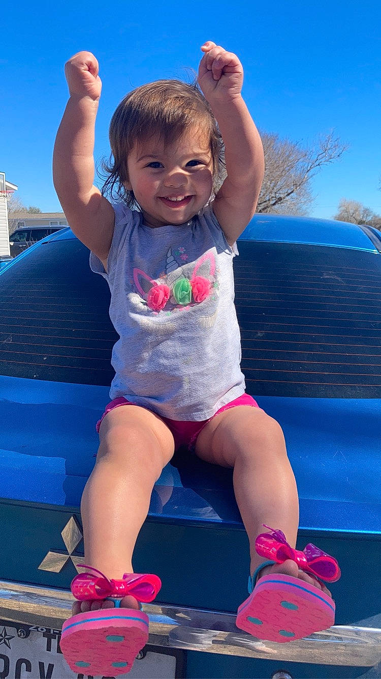 Selena Rosa joined the competition — help win amazing prizes! baby_toddler_clothing, blue, footwear, fun, gesture, grass, happy, joy, leg, leisure, person, pink, recreation, shorts, shoulder, sky, smile, summer, t_shirt, thigh