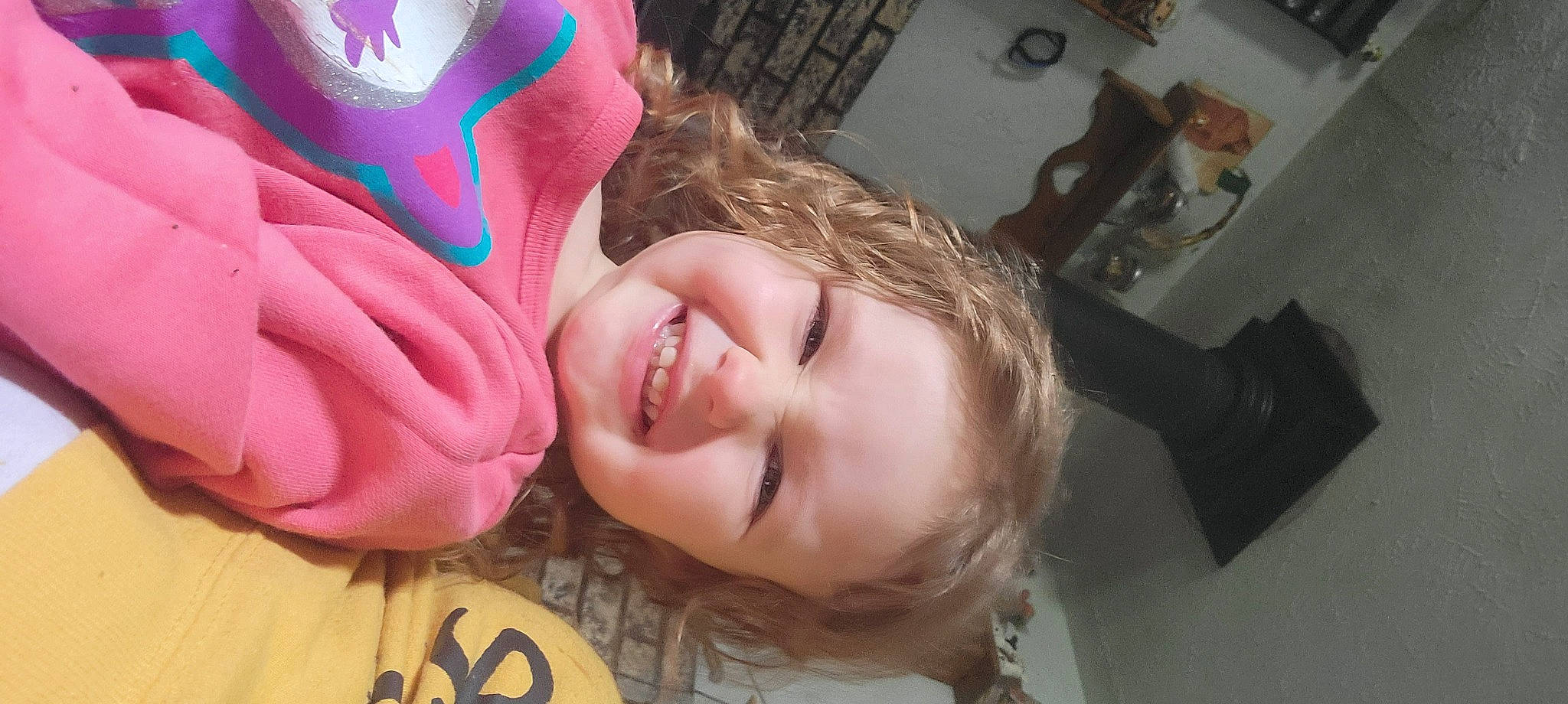 Emma is registered to the contest to win money with this photo: baby, baby_laughing, cap, cheek, child, chin, eye, eyebrow, fun, happy, headgear, joy, lip, mouth, nose, person, petal, skin, smile, textile