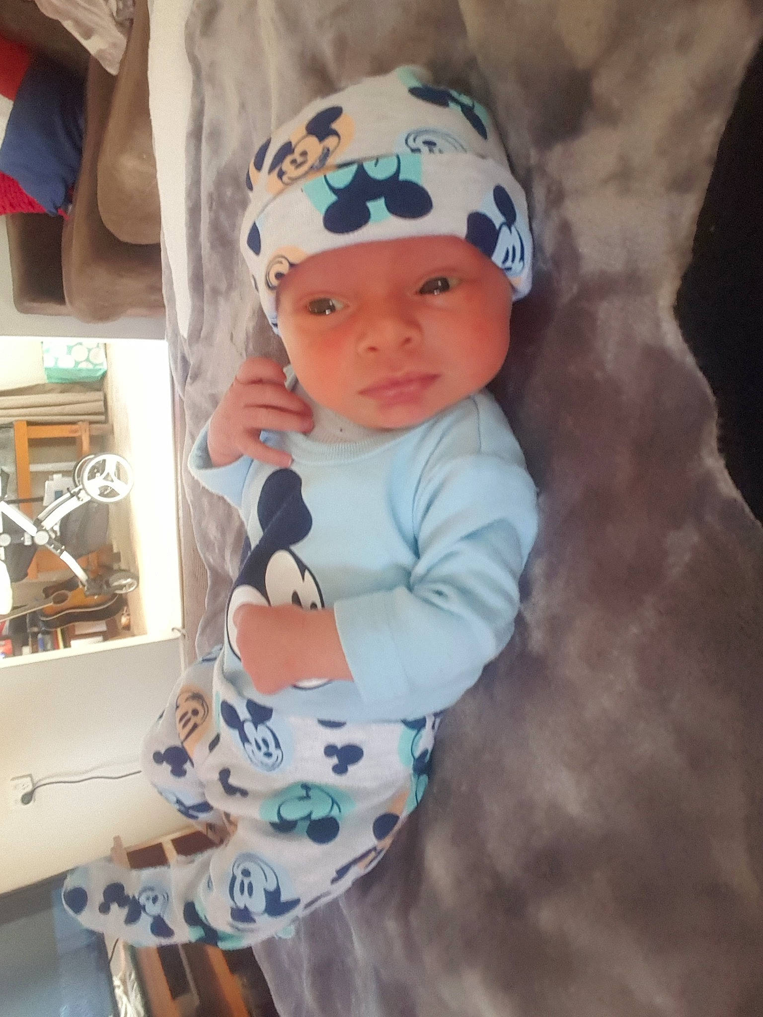 Angus is registered to the contest to win money with this photo: baby, beanie, cap, child, headgear, headwear, person, toddler