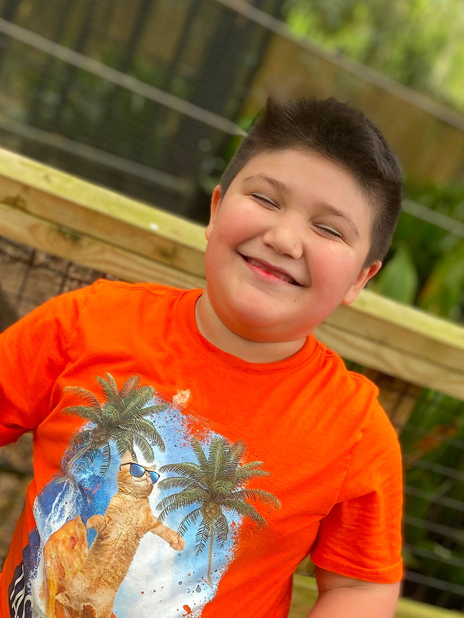 Marlon joined the competition — help win amazing prizes! arthropod, electric_blue, eye, floral_design, grass, hair, happy, insect, joy, leisure, pattern, people_in_nature, person, plant, sleeve, smile, soil, t_shirt, top, tree