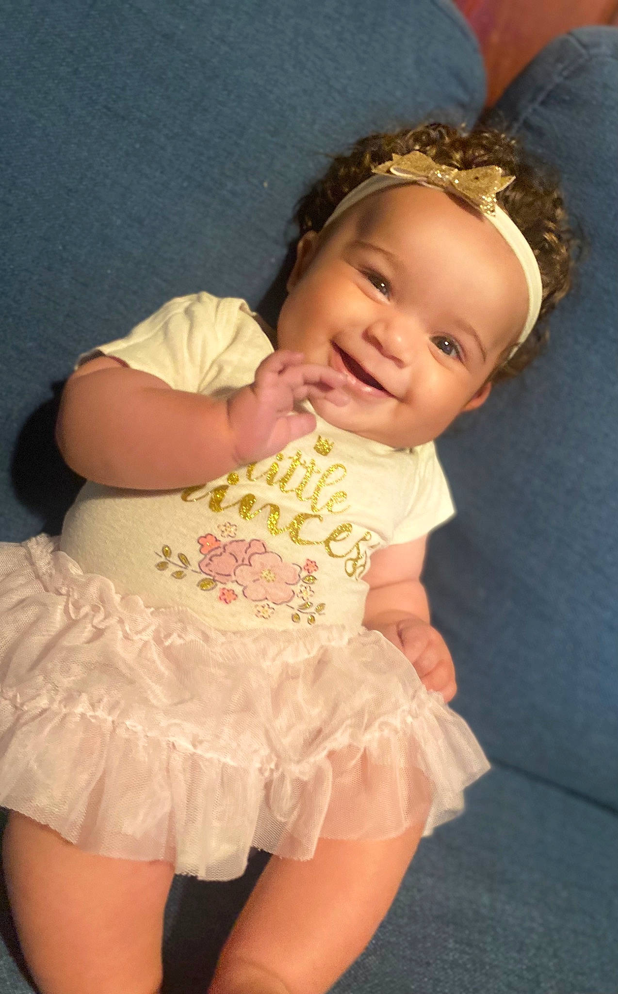 Khaleeah joined the competition — help win amazing prizes! baby_toddler_clothing, day_dress, dress, embellishment, finger, flash_photography, hair, hand, happy, headgear, headwear, human_body, iris, joy, person, pink, ruffle, skin, sleeve, smile