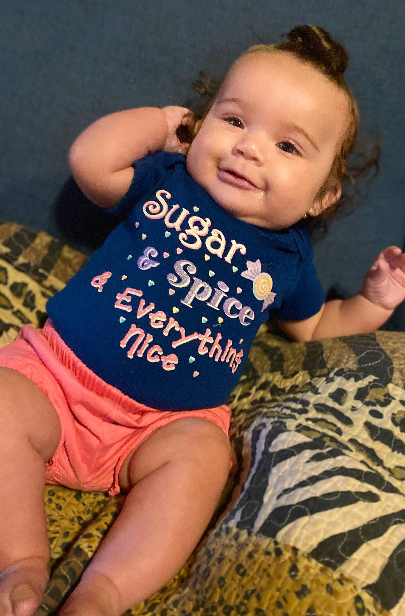 Khaleeah joined the competition — help win amazing prizes! baby_toddler_clothing, eye, facial_expression, finger, flash_photography, hair, hairstyle, hand, happy, head, human_body, joy, knee, leg, neck, person, pink, skin, smile, thigh