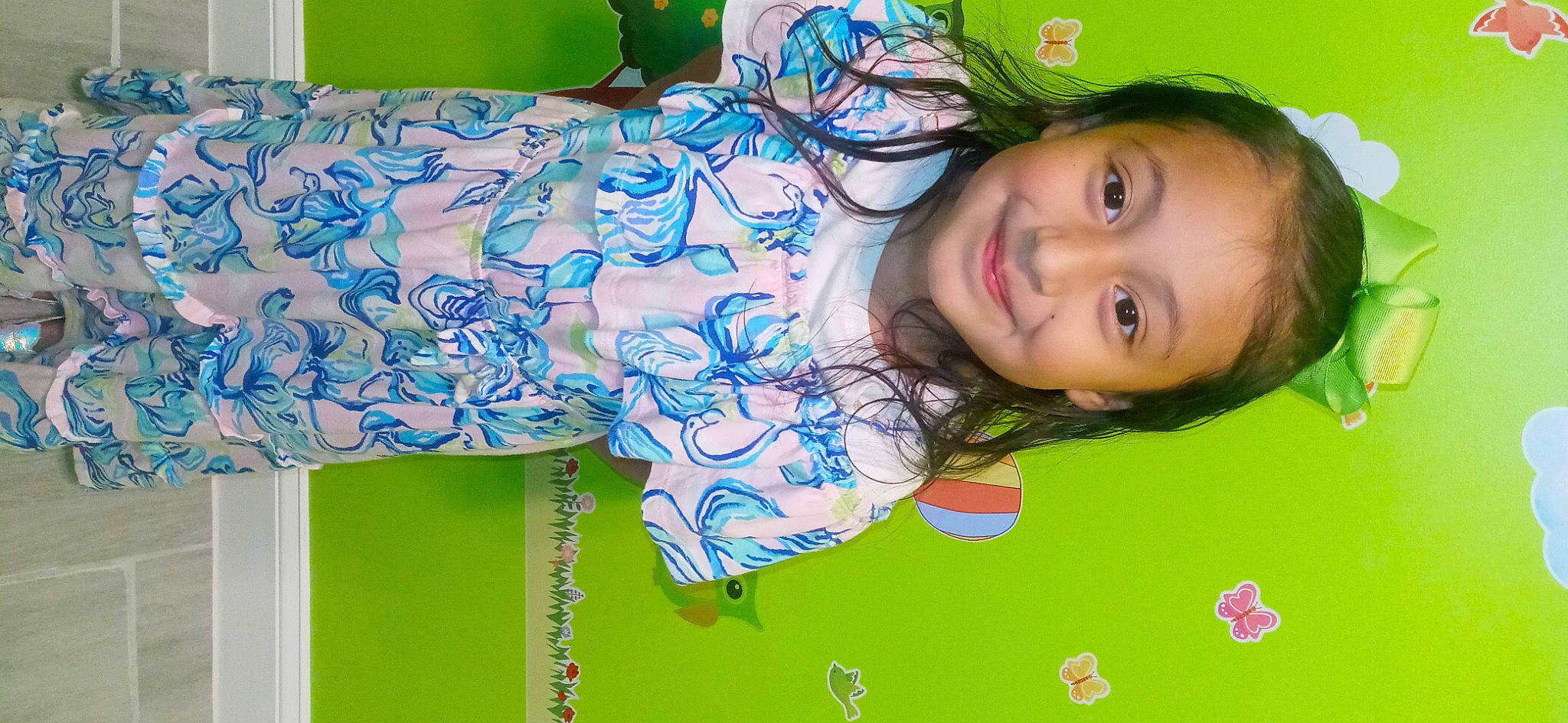 Lila is registered to the contest to win money with this photo: child, electric_blue, fun, grass, green, happy, joy, linens, pattern, person, plant, room, sleeve, smile, t_shirt, toddler, visual_arts