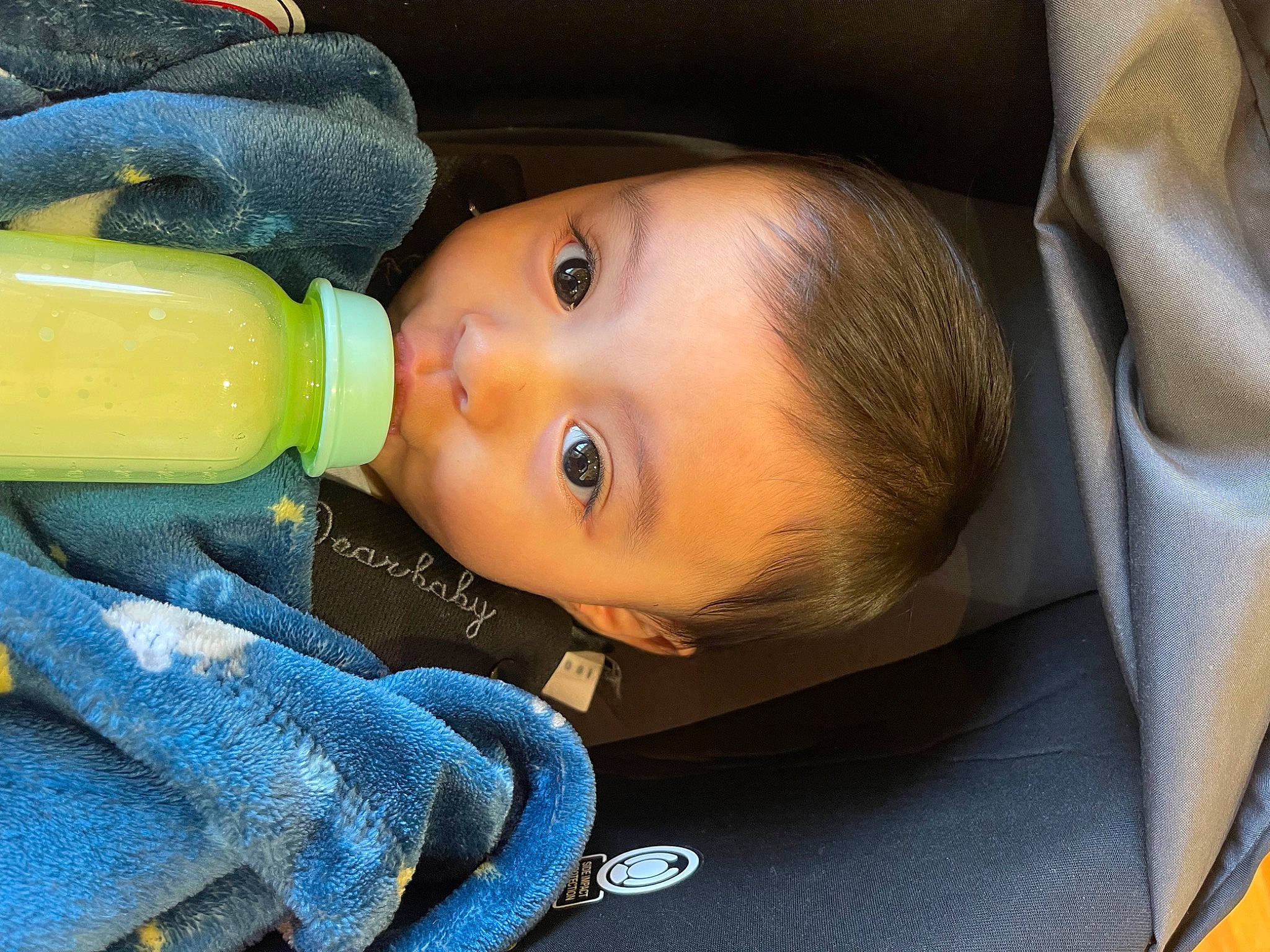 Andres joined the competition — help win amazing prizes! baby, baby_products, baby_toddler_clothing, bottle, cheek, child, comfort, drinkware, electric_blue, eye, eyelash, fun, iris, lip, nose, person, plastic, plastic_bottle, product, skin