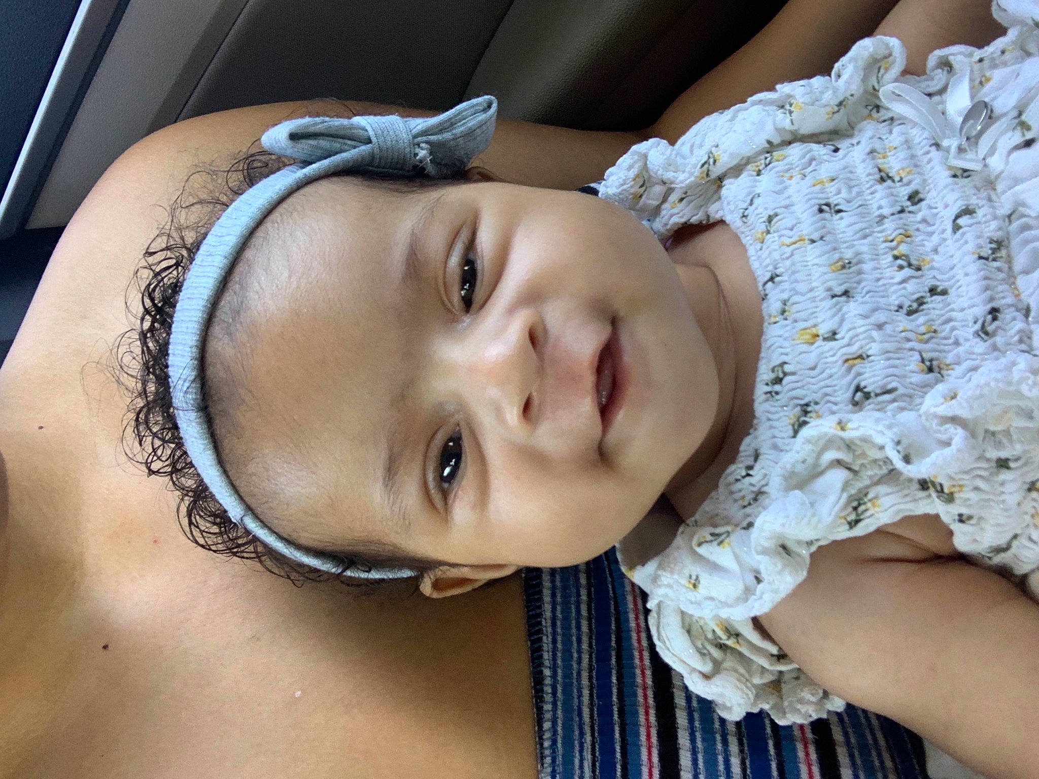 Nia is registered to the contest to win money with this photo: beauty, black_hair, cheek, close_up, eyebrow, eyelash, eyewear, flash_photography, happy, hat, headgear, jaw, jewellery, lip, mouth, nose, person, skin, smile, toddler