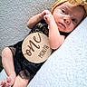 newborn, baby, infant, portrait, lying_down, blanket, headband, wooden_sign, milestone, one_month, face, eyes, hands, feet, black_outfit, safari_animals, indoor, close_up, candid, photography
