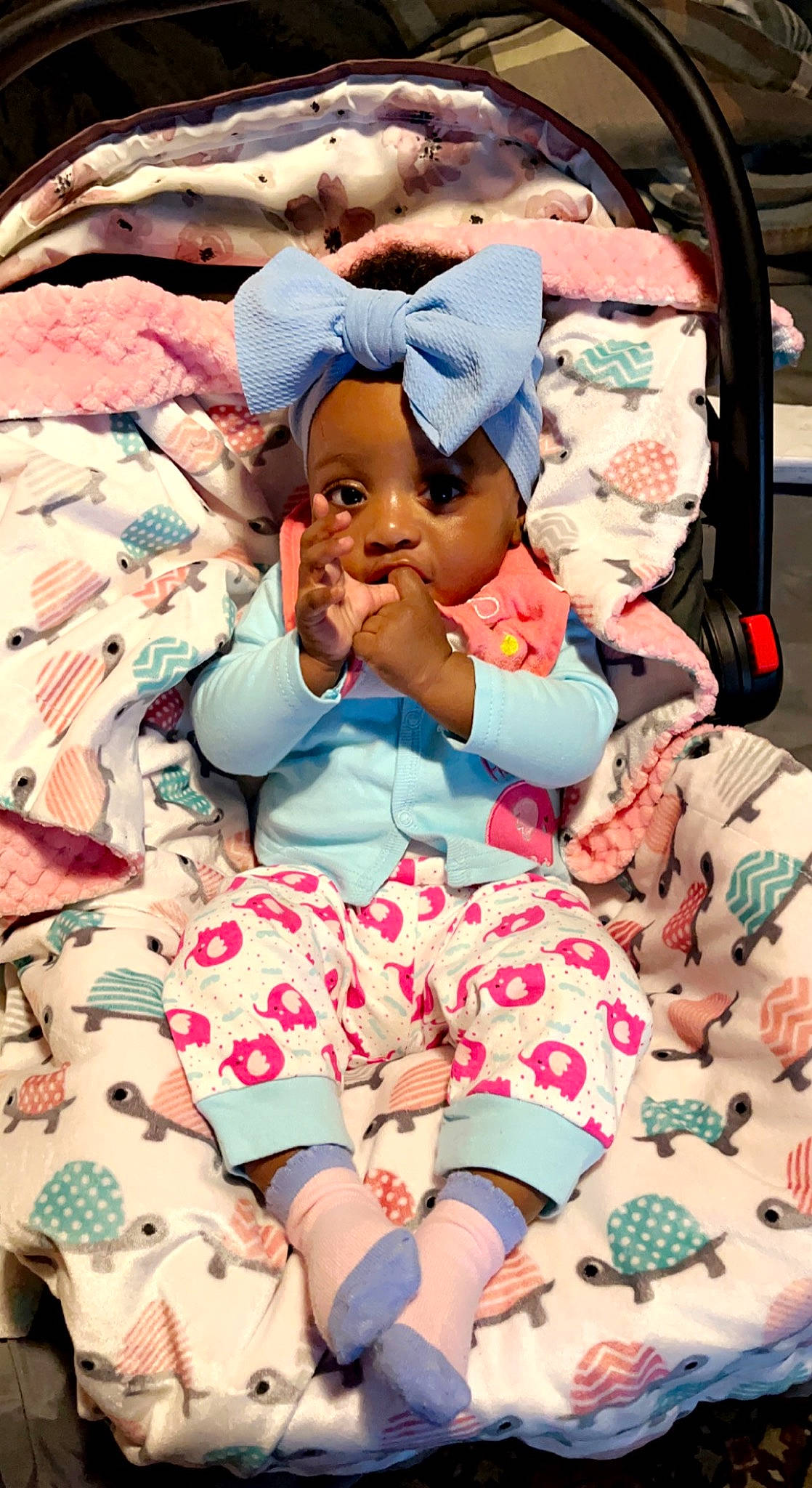 Nalani joined the competition — help win amazing prizes! baby, baby_sleeping, baby_toddler_clothing, cheek, child, comfort, happy, hat, linens, pattern, people, person, photograph, pink, product, skin, sleeve, sock, textile, thigh