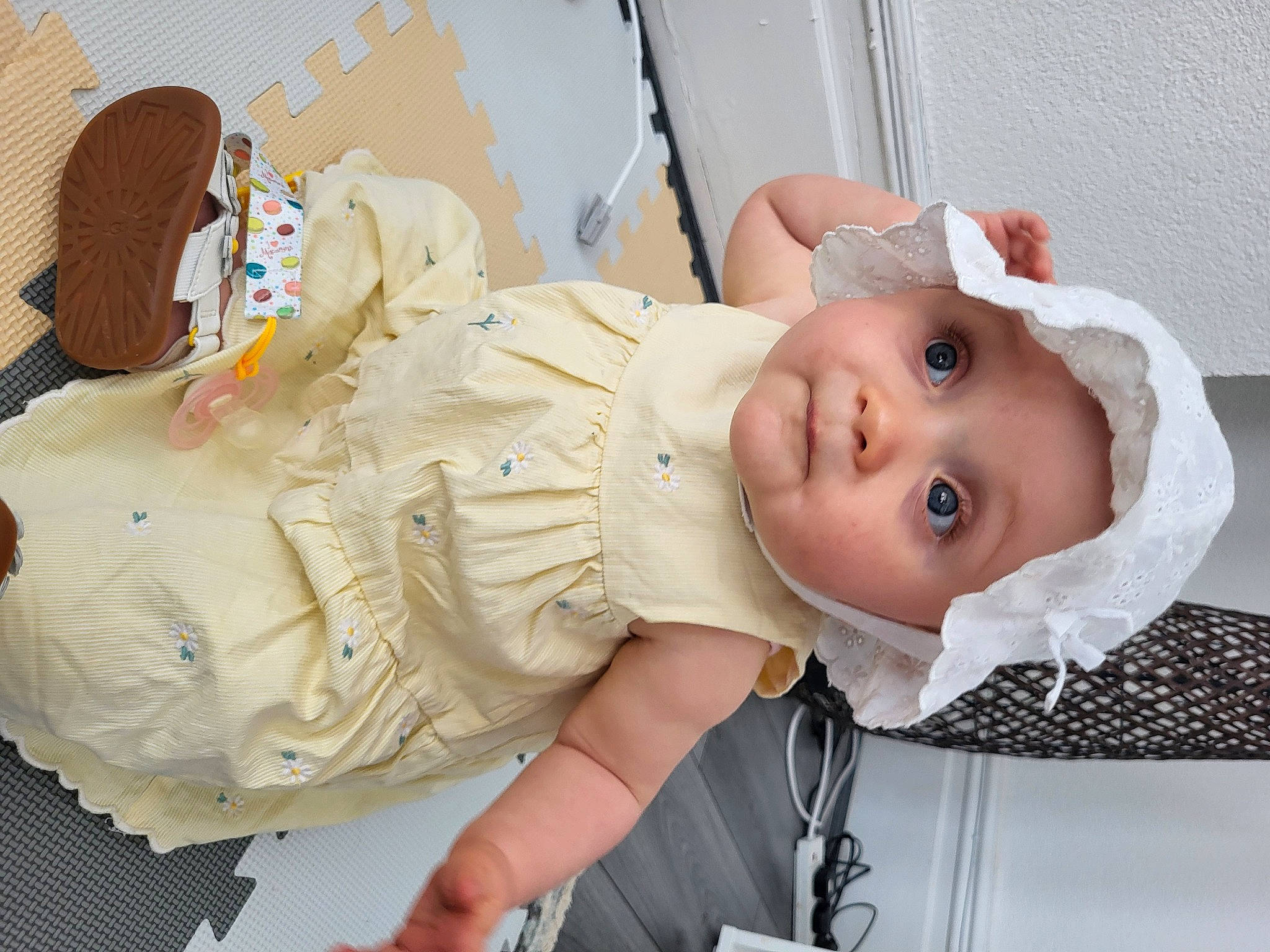 Esmé joined the competition — help win amazing prizes! baby, baby_products, baby_toddler_clothing, cheek, child, comfort, dress, event, eyelash, fashion_accessory, happy, hat, headwear, jewellery, mouth, person, room, sitting, skin, smile