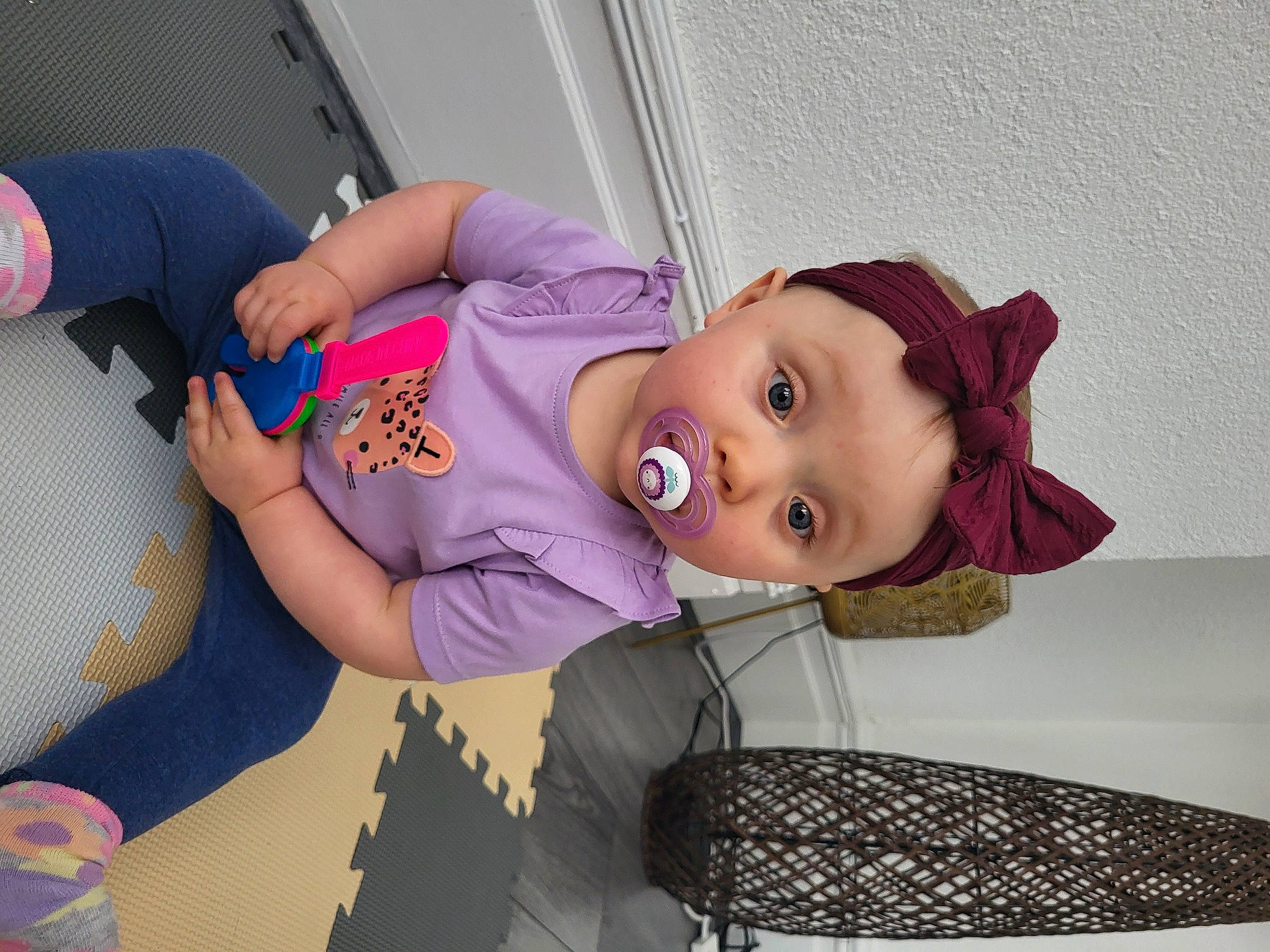 Esmé joined the competition — help win amazing prizes! abdomen, child, comfort, costume, facial_expression, fun, happy, hat, headwear, human_leg, magenta, mouth, pattern, person, pink, purple, room, smile, surprise, thigh