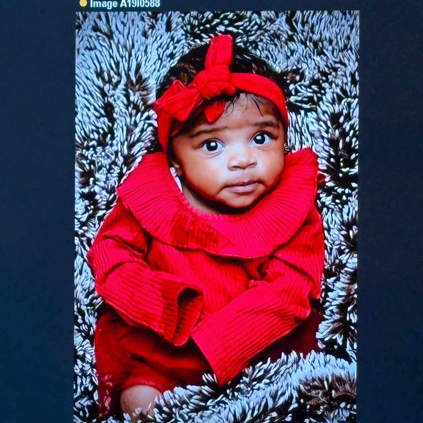 Mickeda is registered to the contest to win money with this photo: baby, bodypart, cap, clothing, computerhardware, electronics, face, finger, hardware, hat, head, hood, knitwear, monitor, person, photography, portrait, screen, sweater, tv