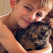 Annabelle joined the competition — help win amazing prizes! boy, child, cat, tortoiseshell_cat, hug, affection, indoor, portrait, smile, pet, animal, love, closeup, happy, young, cuddle, feline, face, skin, human
