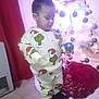 Junior joined the competition — help win amazing prizes! toddler, child, christmas_tree, ornament, pajamas, grinch, holiday, indoors, floor, boots, curtain, red, white, black_footwear, decorations, festive, holiday_season, young_child, cute, winter_clothing