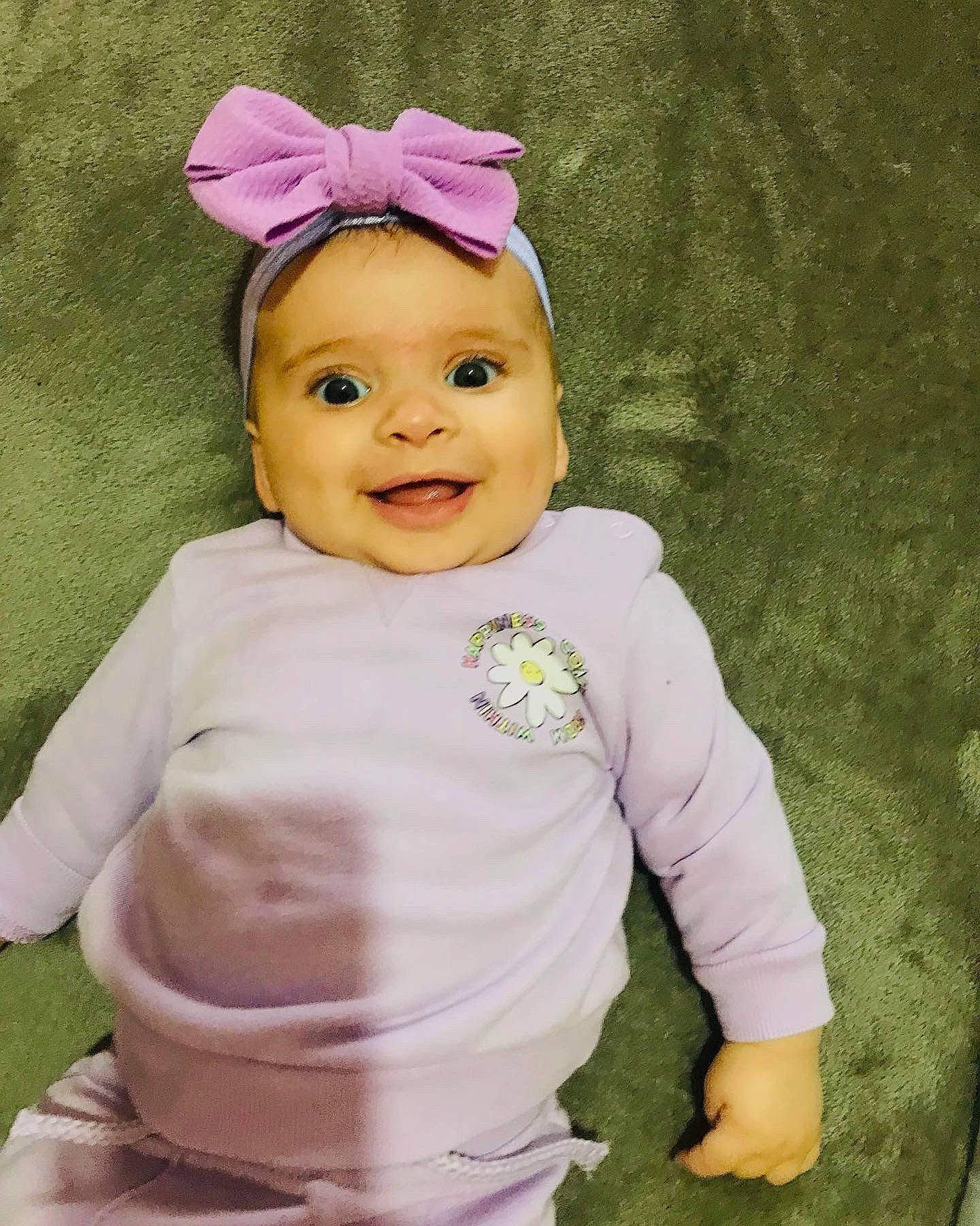 Melissa participe au concours pour gagner de l'argent avec cette photo : baby, baby_toddler_clothing, cheek, costume_hat, face, grass, happy, head, headgear, headpiece, headwear, outerwear, person, pink, purple, skin, sleeve, smile, t_shirt, toddler