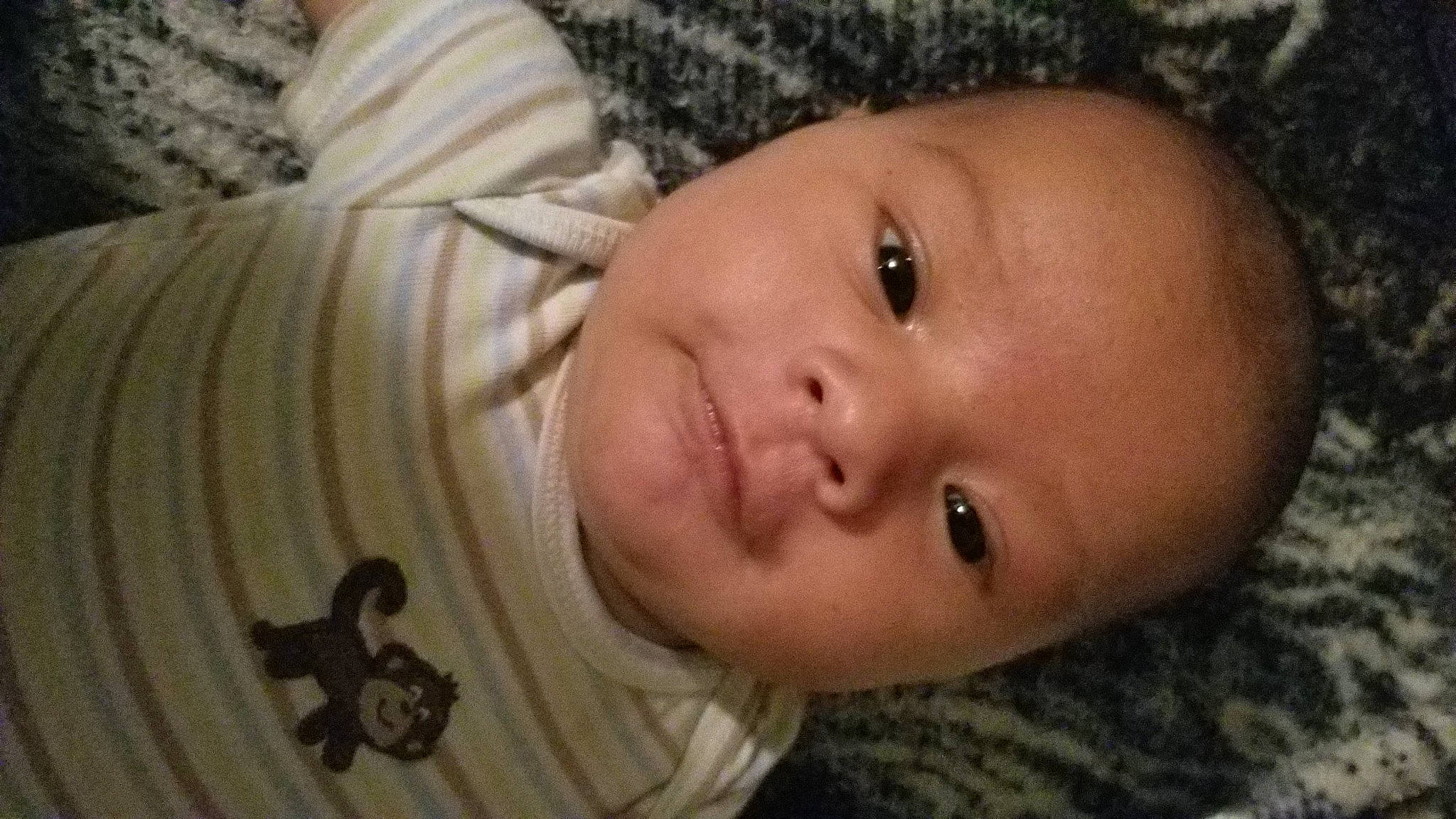 Arlo James is registered to the contest to win money with this photo: baby, cheek, child, chin, close_up, ear, eye, eyebrow, face, finger, forehead, head, iris, lip, mouth, nose, organ, person, portrait_photography, skin