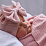 baby, sleeping, pink, blanket, hat, bow, cozy, newborn, infant, soft, texture, cute, resting, portrait, child, peaceful, indoors, headwear, closeup, toddler