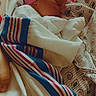 Mayia joined the competition — help win amazing prizes! architecture, baby, bed, blanket, building, cap, clothing, couch, face, furniture, glove, hat, head, newborn, person, photography, portrait, quilt, sleeping, towel