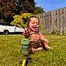 Zakai is registered to the contest to win money with this photo: baby, child, grass, water, sprinkler, outdoor, sunny, smiling, splash, summer, garden, fence, tree, greenery, play, happy, waterdrops, yard, nature, daytime