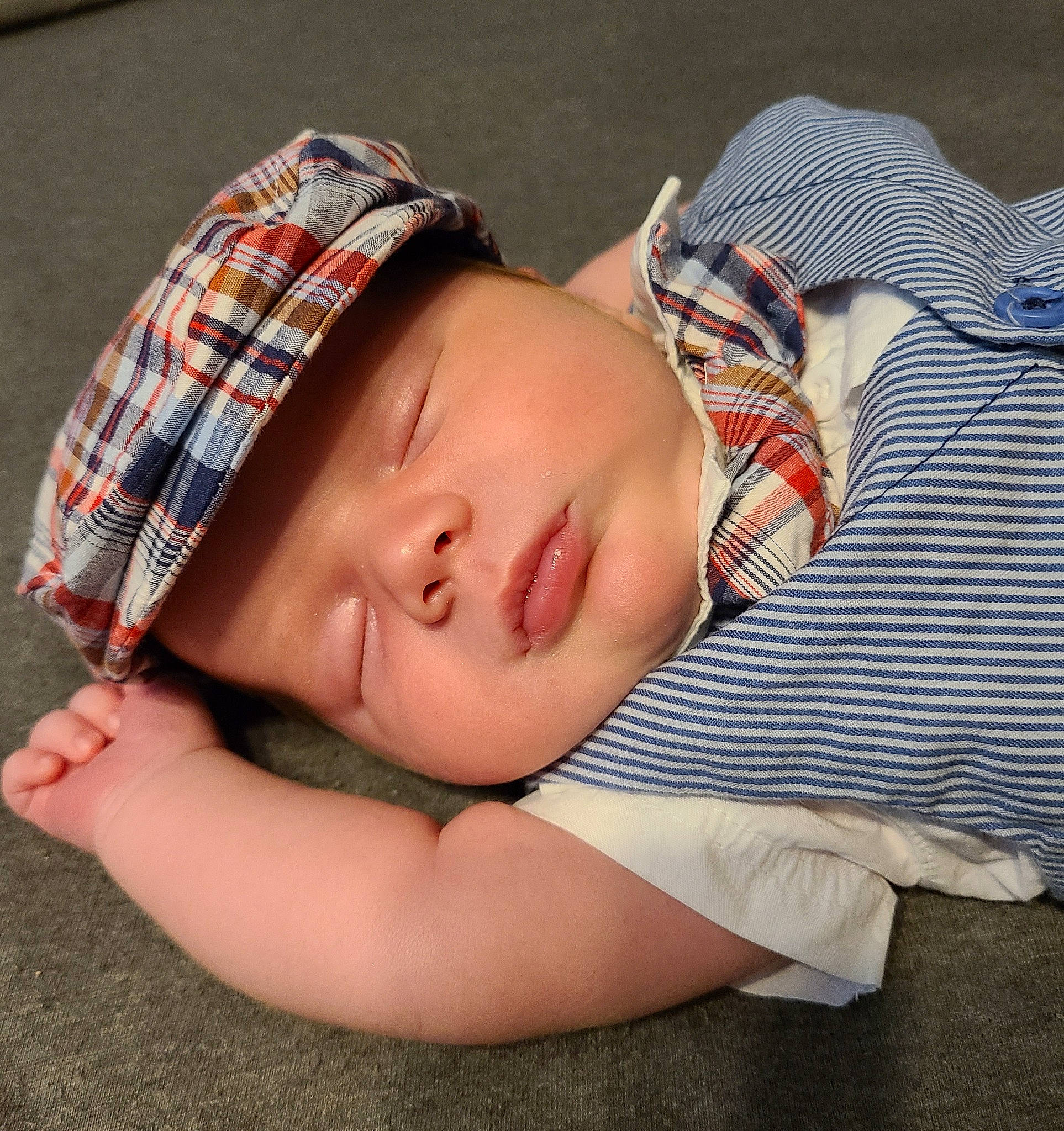 Dominick joined the competition — help win amazing prizes! baby, baby_toddler_clothing, cap, cheek, child, comfort, fashion_accessory, happy, headgear, headwear, lip, nose, pattern, person, plaid, sitting, skin, sleeve, tartan, textile