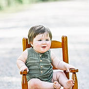 Charles joined the competition — help win amazing prizes! armchair, baby, bodypart, chair, clothing, face, finger, furniture, hand, happy, head, pants, person, photography, portrait, rockingchair, sitting, smile, t_shirt, wood