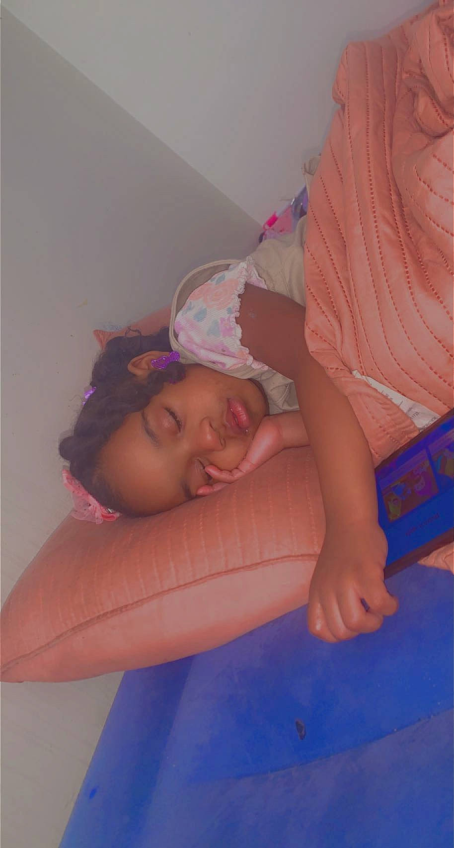 Nayani is registered to the contest to win money with this photo: arm, baby, blue, comfort, eye, finger, hand, head, human_body, joint, leg, mouth, muscle, neck, person, pink, purple, shoulder, skin, smile