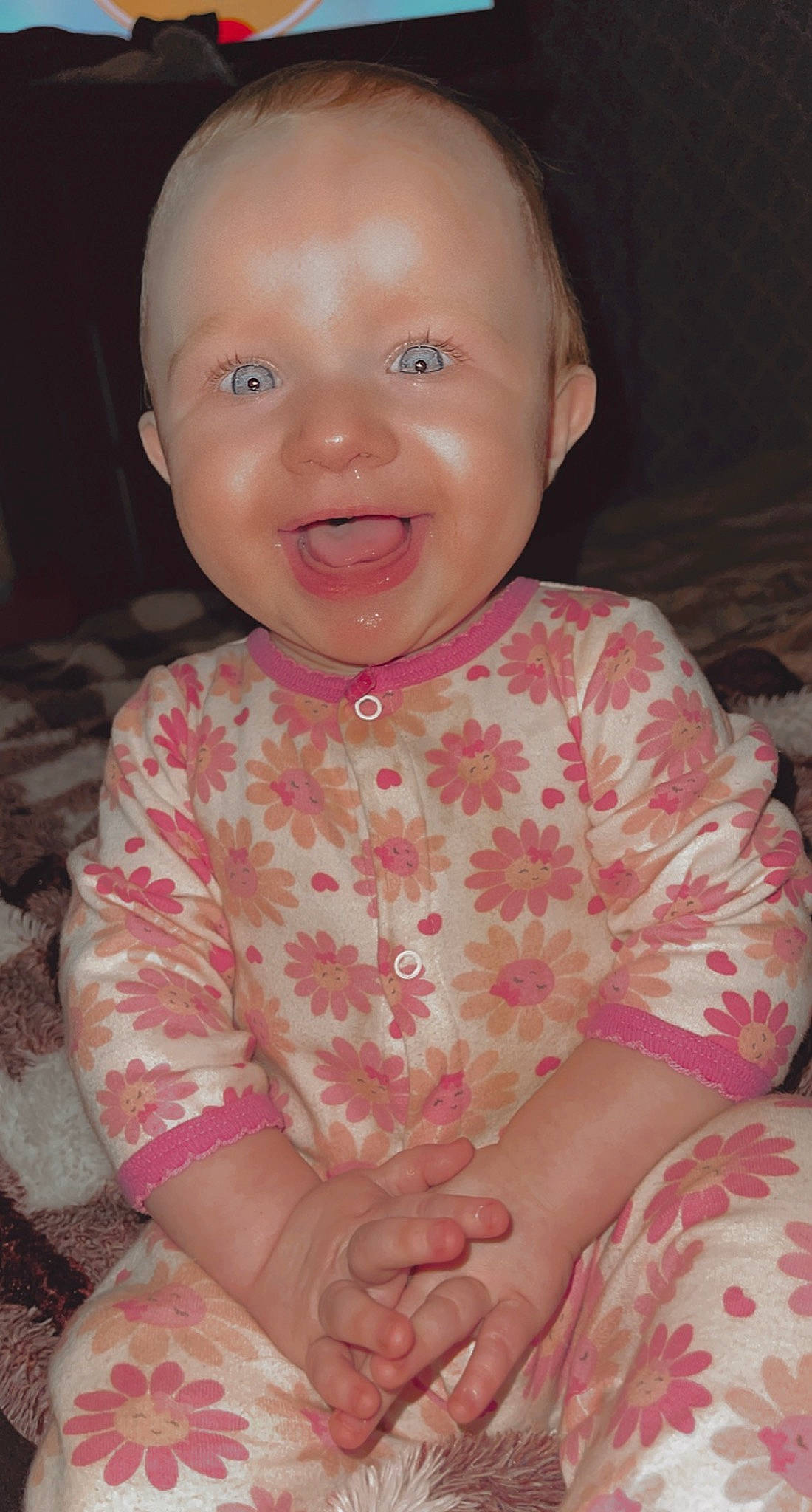 Landry is registered to the contest to win money with this photo: baby, baby_laughing, baby_toddler_clothing, cheek, child, chin, dress, happy, human_body, lip, magenta, mouth, nose, pattern, person, pink, skin, sleeve, smile, t_shirt