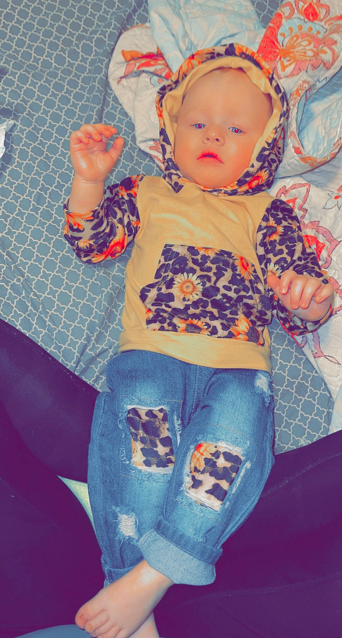 Landry is registered to the contest to win money with this photo: abdomen, baby, baby_toddler_clothing, child, electric_blue, fun, human_body, leg, linens, neck, orange, organ, pattern, person, sleeve, t_shirt, textile, thigh, toddler, trunk