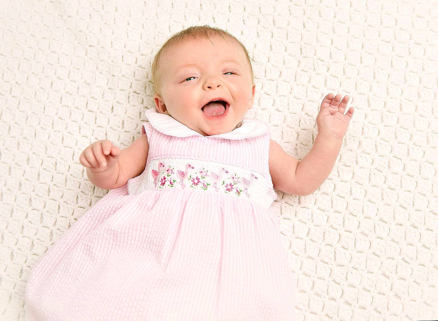 Oakleigh joined the competition — help win amazing prizes! baby, baby_toddler_clothing, beauty, child, collar, day_dress, dress, finger, flooring, gesture, happy, one_piece_garment, pattern, person, pink, product, skin, sleeve, smile, textile