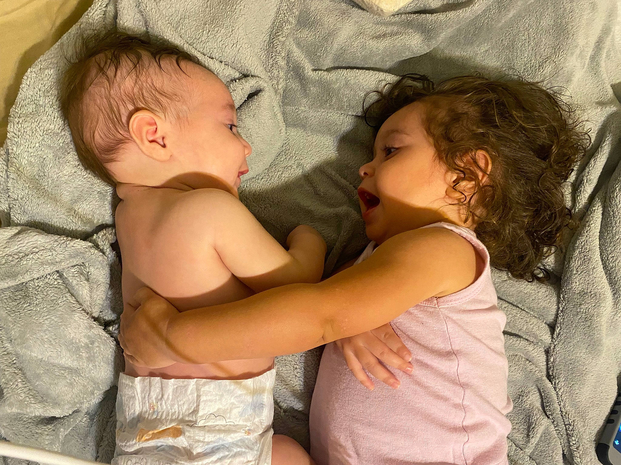 Ava Mckenzie is registered to the contest to win money with this photo: abdomen, arm, baby, baby_sleeping, bed, bedding, bedtime, chest, child, comfort, elbow, fun, gesture, happy, head, linens, person, room, skin, toddler