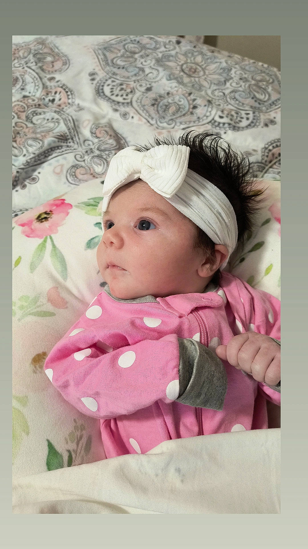 Lylah is registered to the contest to win money with this photo: art, baby, baby_toddler_clothing, beanie, cap, cheek, child, collar, eyelash, fashion_accessory, fur, headwear, linens, magenta, pattern, person, picture_frame, pink, portrait_photography, room