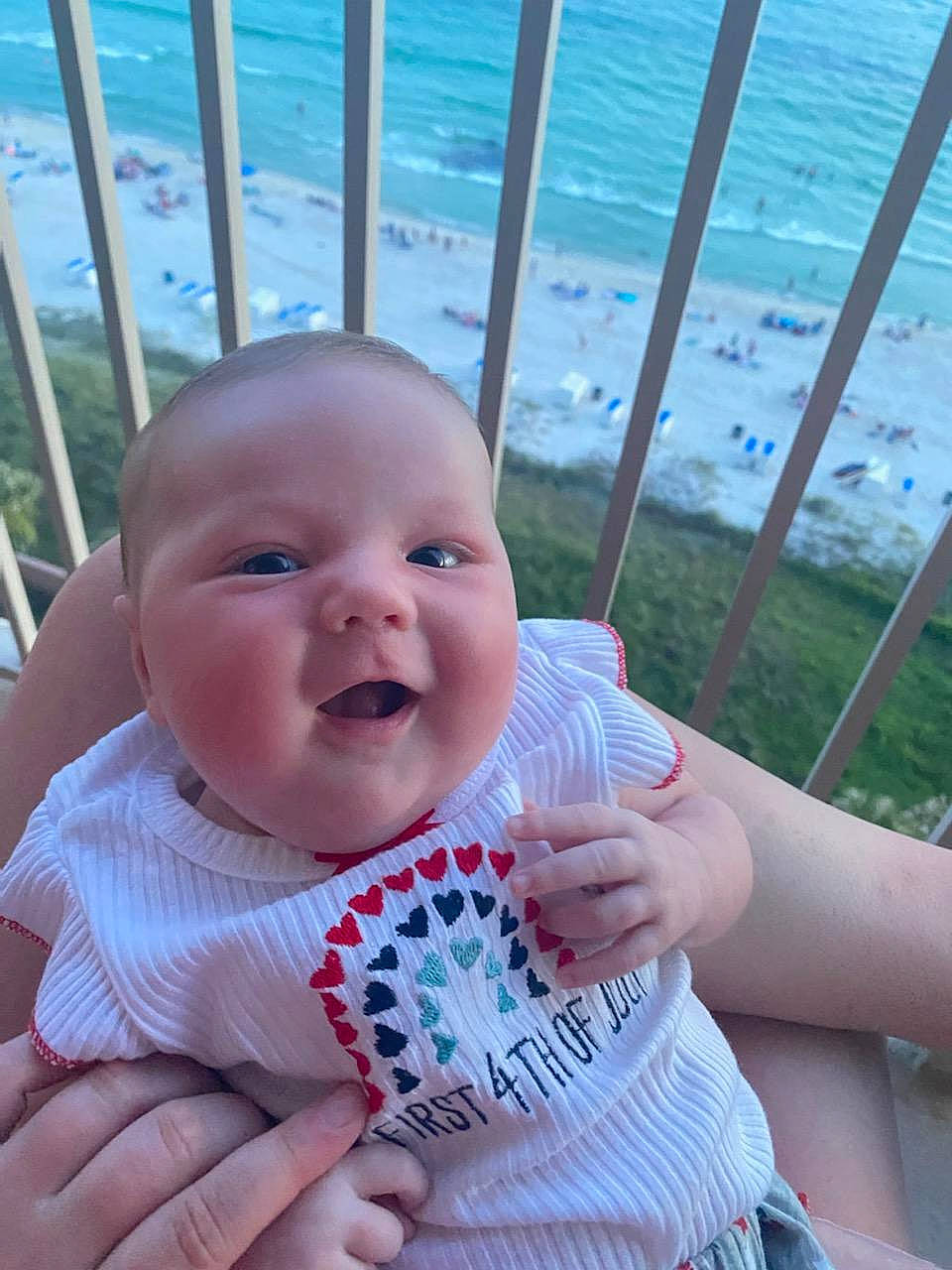 Dani joined the competition — help win amazing prizes! baby, baby_toddler_clothing, cheek, child, facial_expression, finger, gesture, grass, hairstyle, happy, head, lip, mouth, nail, nose, person, skin, smile, thumb, toddler