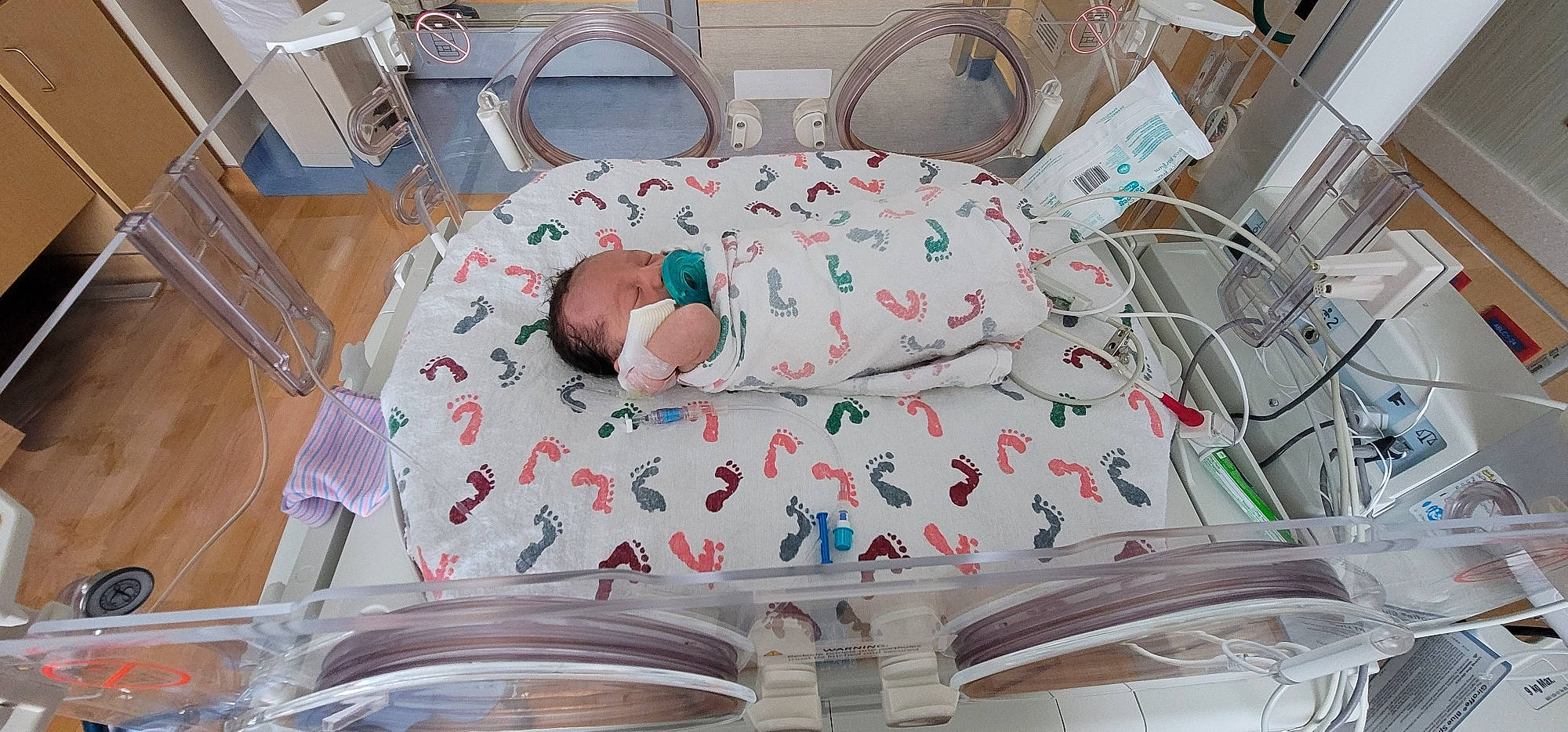 Jaeden joined the competition — help win amazing prizes! baby, baby_products, baby_safety, bed, bed_frame, bedding, child, comfort, event, hat, health_care, hospital, laundry_room, linens, medical, medical_equipment, person, product, room, textile