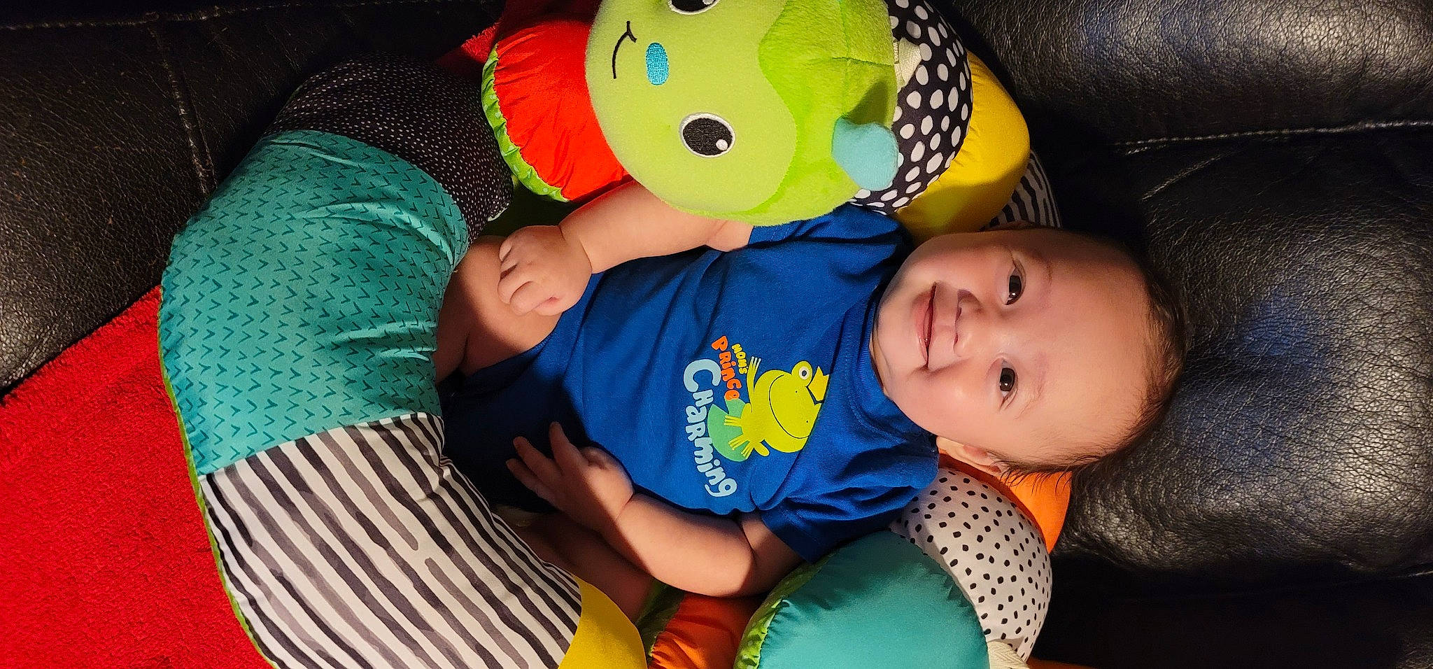 Jaeden is registered to the contest to win money with this photo: baby, baby_toddler_clothing, cheek, child, comfort, eye, facial_expression, fun, green, happy, iris, joy, mouth, nose, person, skin, smile, stuffed_toy, t_shirt, toddler