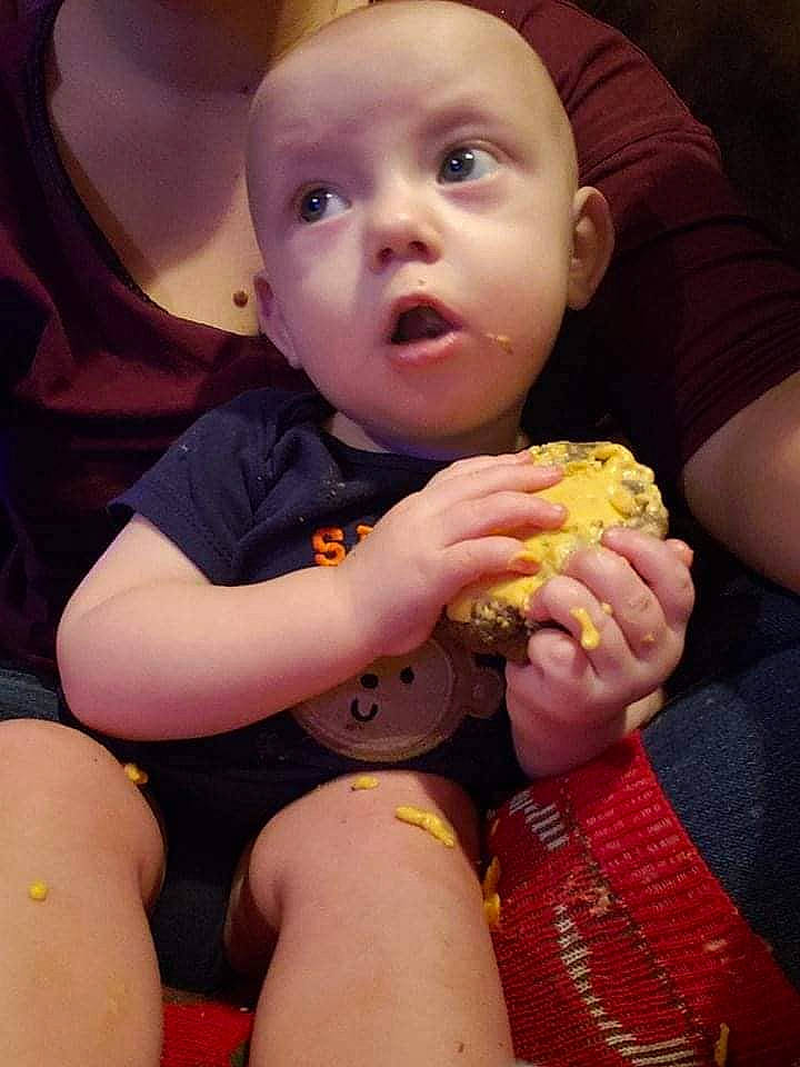 Mikel joined the competition — help win amazing prizes! abdomen, arm, cheek, child, ear, eating, face, finger, fun, girl, hand, head, infant, leg, lip, mouth, person, sitting, skin, smile