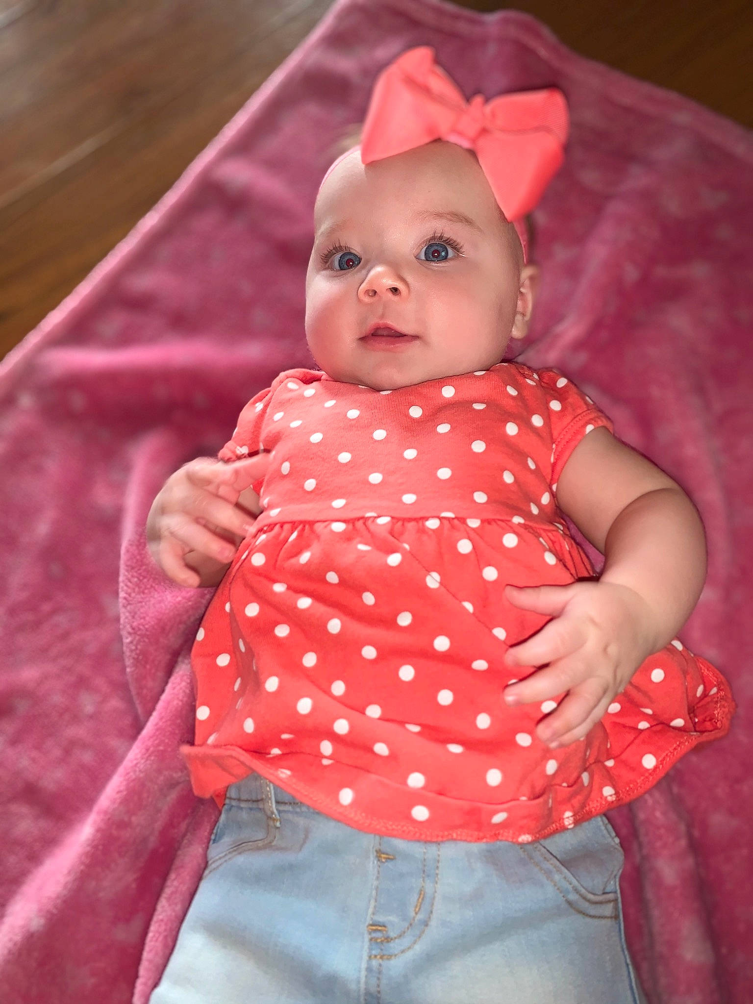 Laney is registered to the contest to win money with this photo: baby, baby_products, baby_toddler_clothing, cheek, child, design, headwear, lip, magenta, pattern, peach, person, pink, polka_dot, product, red, skin, toddler