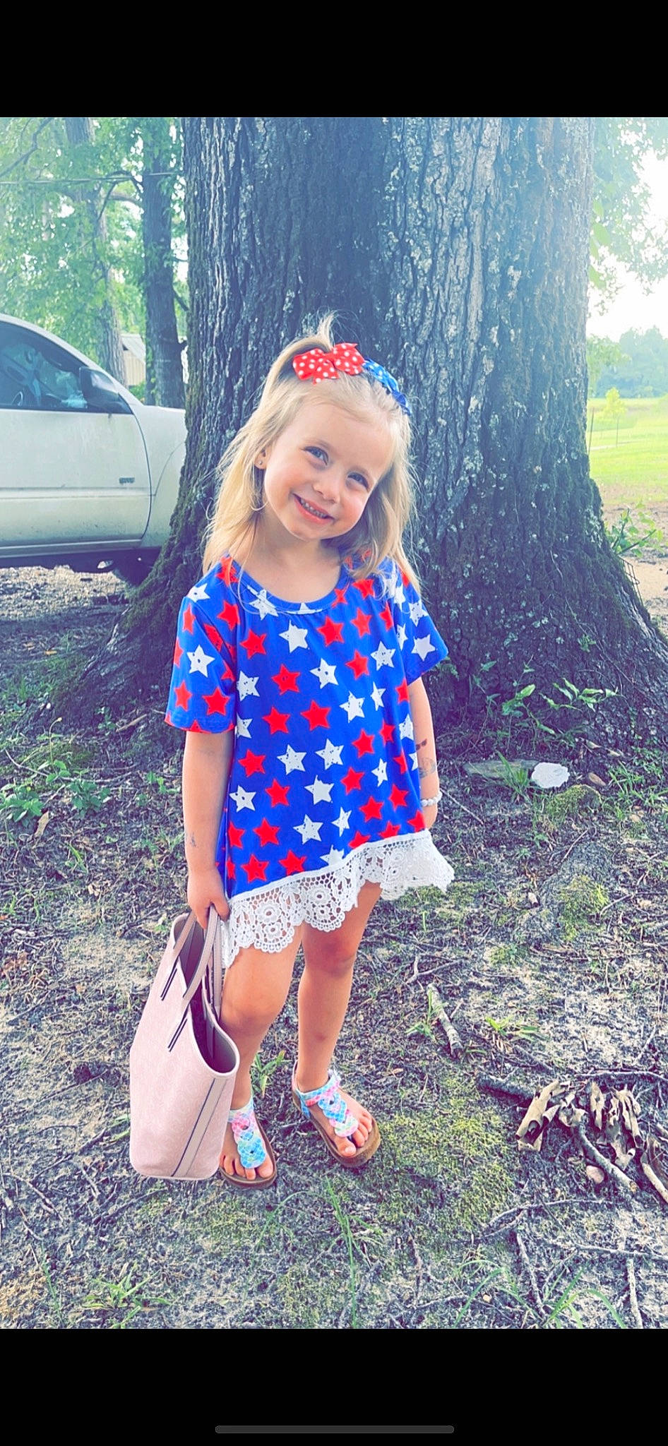 Ensley is registered to the contest to win money with this photo: automotive_tire, baby_toddler_clothing, beauty, electric_blue, eye, grass, green, happy, joy, leaf, leisure, magenta, people_in_nature, person, plant, recreation, shorts, smile, summer, tints_and_shades