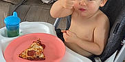 Michael joined the competition — help win amazing prizes! blanket, carpet, child, couch, cup, eating, furniture, happy, high_chair, indoor, living_room, pepperoni_pizza, person, pikachu, pizza, plate, plush_toy, sippy_cup, thumbs_up, toddler